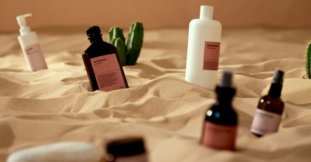 Cosmetic and skincare products artistically arranged on sand with cactus accents, evoking a desert vibe.